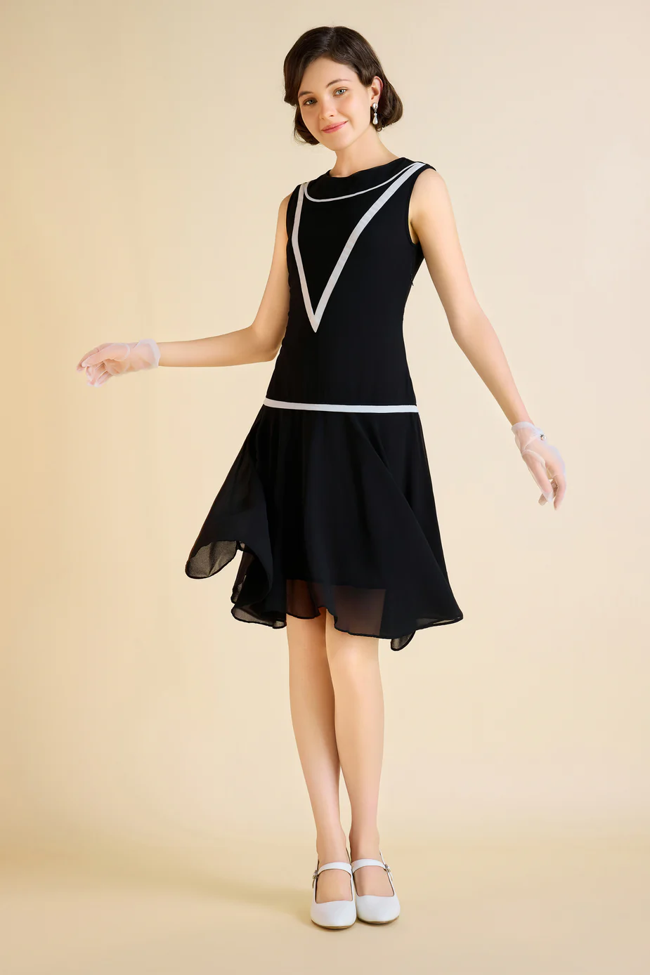 woman in a black 1920s Dress, Sleeveless with white accent lines