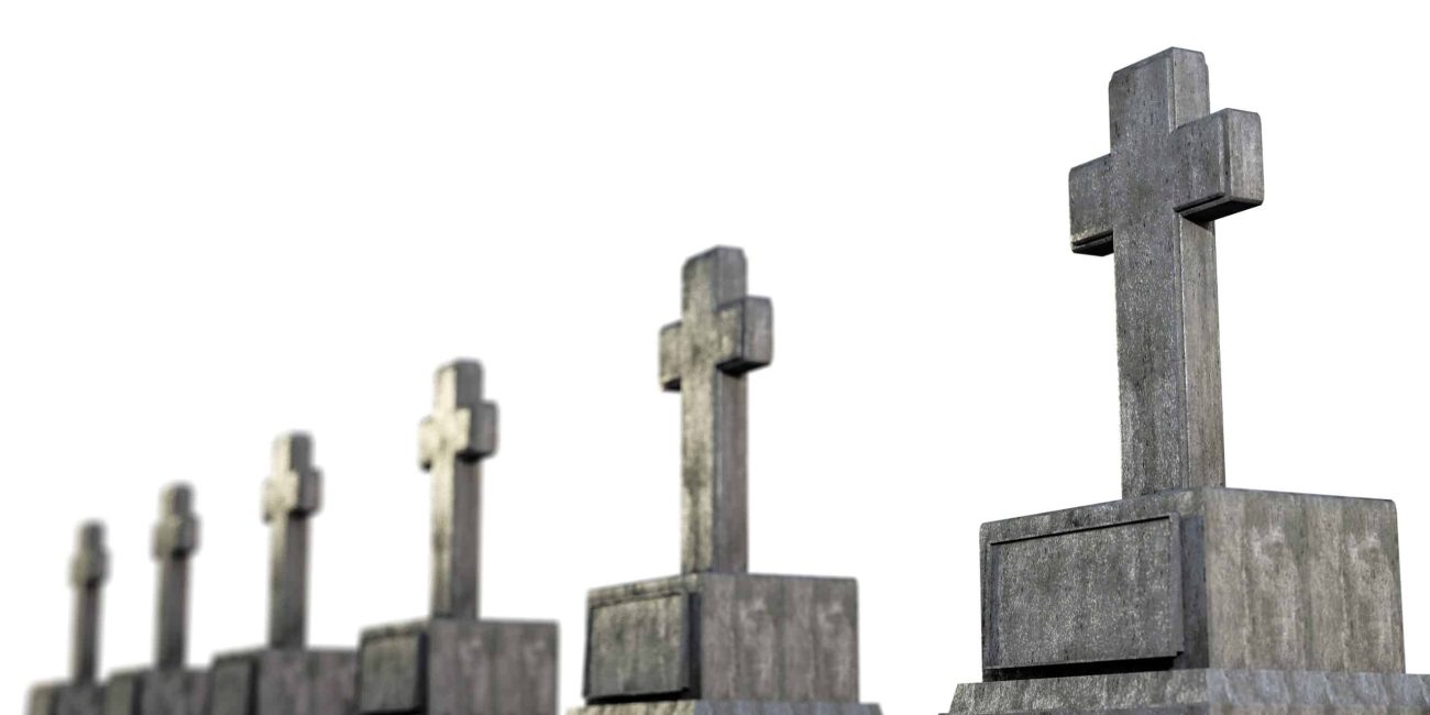 several crosses on tombs arrayed in a straight line