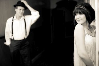 Flapper Girl flirting with young man in The Great Gatsby