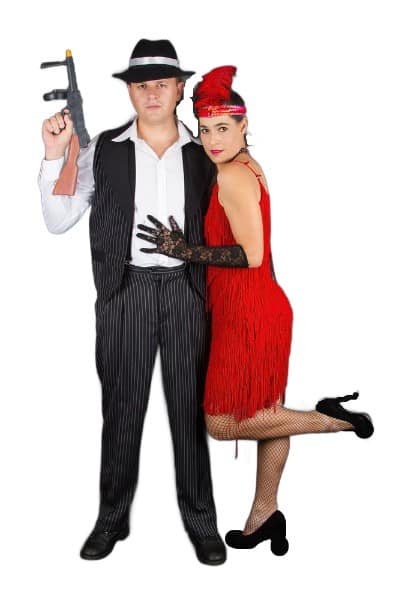 Bonnie and Clyde Costume - lady wearing red costume and the man wearing black and white with a tommy gun props